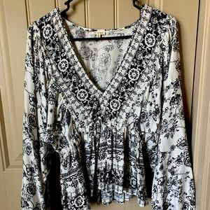 Deep cut balloon sleeve blouse